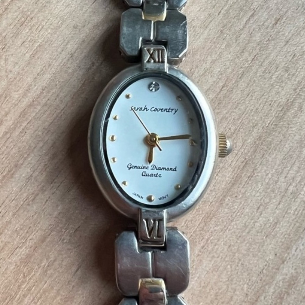 Sarah Coventry ladies oval silver tone diamond dress Watch NEW BATTERY